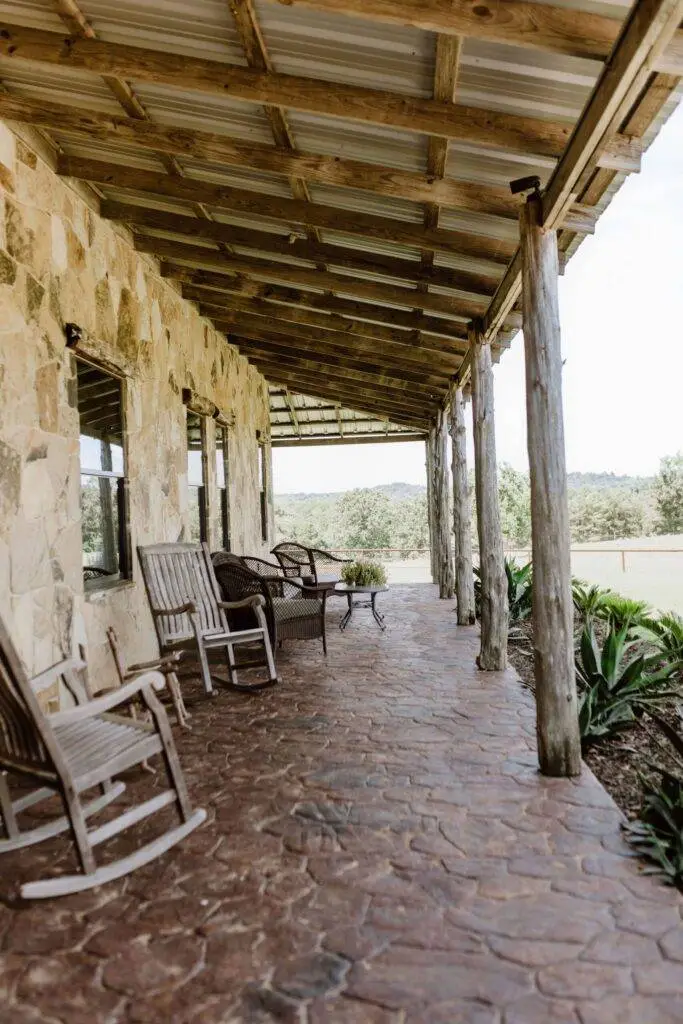two racking chairs and a sofa set and small center table with shed