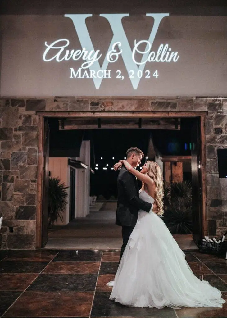 Stone wall night time Groom and the bride dancing