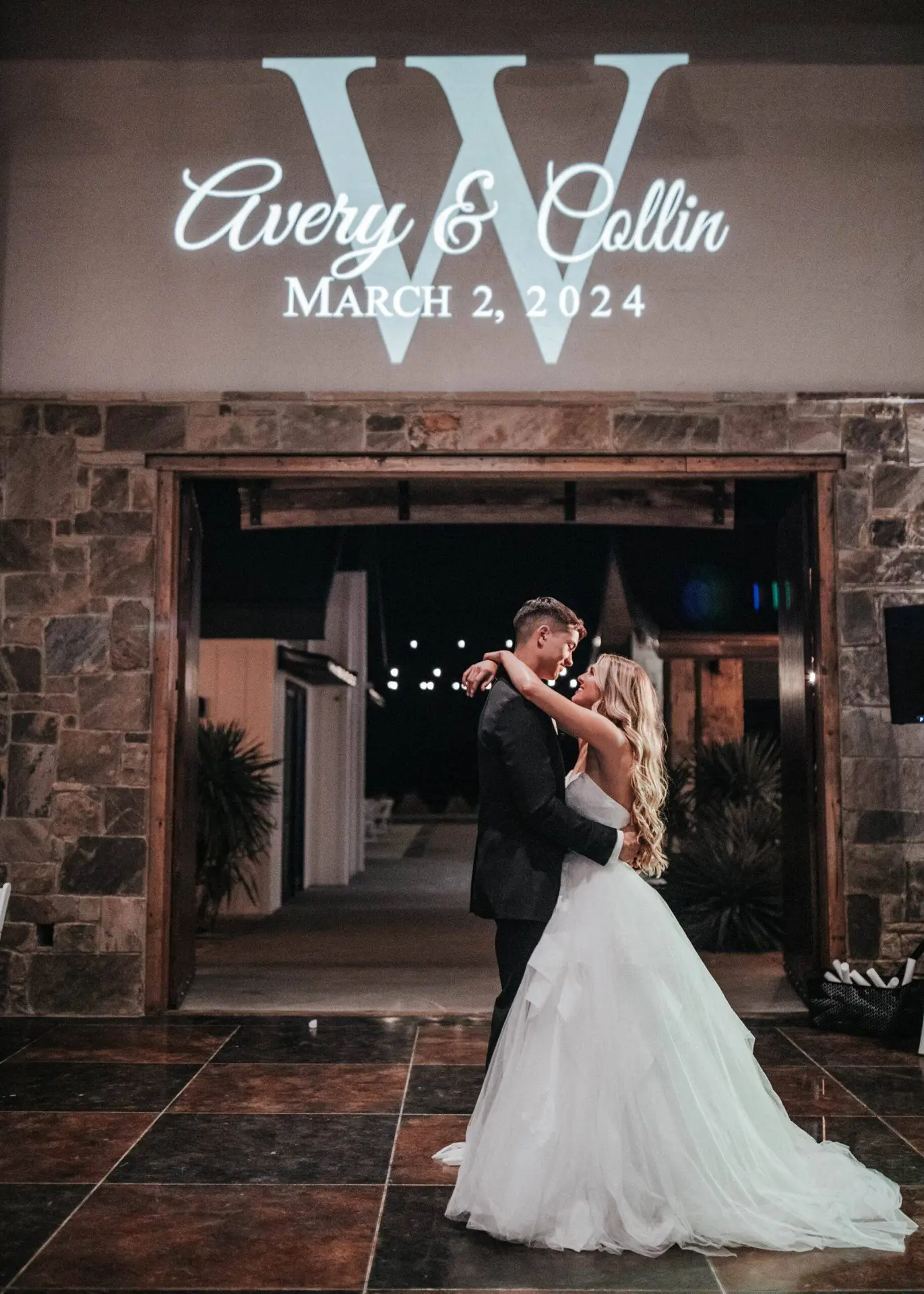 Stone wall night time Groom and the bride dancing